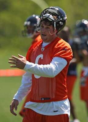 LAKE FOREST, IL - MAY 20: Jay Cutler #6 of the Chicago Bearstalks with a teammate during an organized team activity (OTA) practice on May 20, 2009 at Halas Hall in Lake Forest, Illinois. (Photo by Jonathan Daniel/Getty Images)