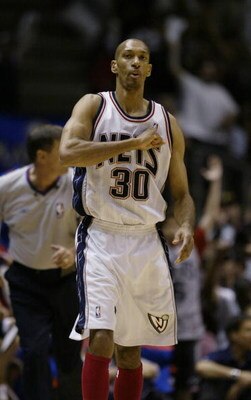EAST RUTHERFORD, NJ - MAY 16:  Kerry Kittles #30 of the New Jersey Nets on the court in Game six of the Eastern Conference Semifinals during the 2004 NBA Playoffs against the Detroit Pistons at Continental Airlines Arena on May 16, 2004 in East Rutherford
