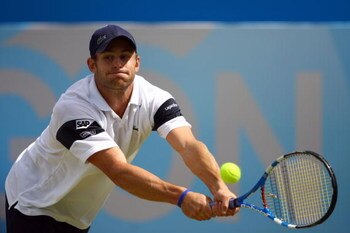 LONDON, ENGLAND - JUNE 13:  Andy Roddick of USA plays a backhand during the men's semi final match against James Blake of USA during Day 6 of the the AEGON Championship at Queens Club on June 13, 2009 in London, England.  (Photo by Julian Finney/Getty Ima