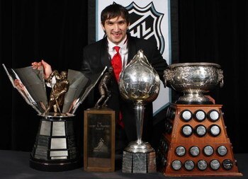 TORONTO, ON - JUNE 12:  Alexander Ovechkin of the Washington Capitals poses with the Hart Memorial Trophy, the Lester B. Pearson Award, the Art Ross Trophy, and the Maurice 'Rocket' Richard Trophy during the 2008 NHL Awards at the Elgin Theatre on June 12