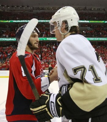 WASHINGTON - MAY 13: Alex Ovechkin #8 of the Washington Capitals and Evgeni Malkin #71 of the Pittsburgh Penguins shake hands after Pittsburgh's 6-2 victory in Game Seven of the Eastern Conference Semifinal  Round of the 2009 Stanley Cup Playoffs at Veriz