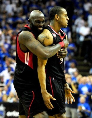 ORLANDO, FL - APRIL 19: Andre Iguodala #9 (R) of the Philadelphia 76ers is hugged by Reggie Evans #30 after making the game winning basket in Game One of the Eastern Conference Quarterfinals during the 2009 NBA Playoffs at Amway Arena on April 19, 2009 in