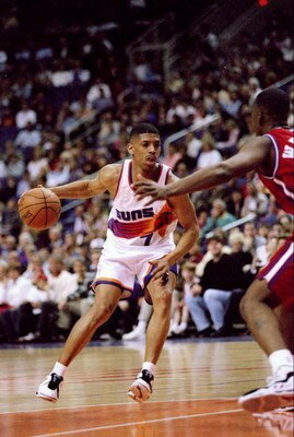 14 Feb 1997:  Guard Kevin Johnson of the Phoenix Suns in action with the ball during a game against the Los Angeles Clippers at the America West Arena in Phoenix, Arizona.  The Suns won the game 110-93. Mandatory Credit: Jed Jacobsohn  /Allsport
