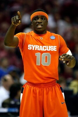 MEMPHIS, TN - MARCH 27:  Jonny Flynn #10 of the Syracuse Orange points in the first half against the Oklahoma Sooners during the NCAA Men's Basketball Tournament South Regionals at the FedExForum on March 27, 2009 in Memphis, Tennessee.  (Photo by Joe Mur