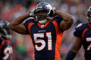 DENVER - NOVEMBER 23:  Linebacker Jamie Winborn #51 of the Denver Broncos celebrates after making a tackle against the Oakland Raiders during week 12 NFL action at Invesco Field at Mile High on November 23, 2008 in Denver, Colorado. The Raiders defeated t