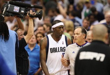 DALLAS - MAY 09:  Forward Josh Howard #5 of the Dallas Mavericks talks with NBA referee Mark Wunderlich after a 106-105 loss against the Denver Nuggets in Game Three of the Western Conference Semifinals during the 2009 NBA Playoffs at American Airlines Ce