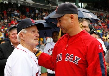 BOSTON - SEPTEMBER 28: Manager Terry Francona of the Boston Red Sox chats with Boston Red Sox great Johnny Pesky during a ceremony where Pesky's No. 6 was retired prior to a baseball game against the New York Yankees at Fenway Park September 28, 2008 in B