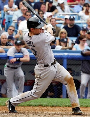 NEW YORK - JULY 19:  Aaron Hill #2 of the Toronto Blue Jays hits a RBI triple in the seventh inning against the New York Yankees during their game at Yankee Stadium on July 19, 2007 in the Bronx borough of New York City. The Jays defeated the Yankees 3-2.