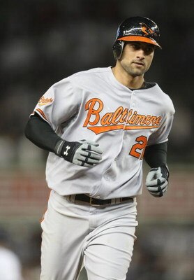 NEW YORK - MAY 21:  Nick Markakis #21 of the Baltimore Orioles runs the bases against the New York Yankees on May 21, 2009 at Yankee Stadium in the Bronx borough of New York City.  (Photo by Nick Laham/Getty Images)