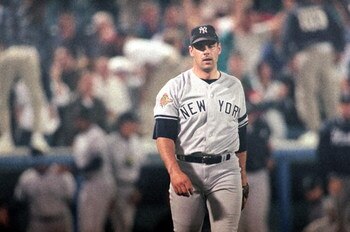 ATLANTA - OCTOBER 22:  John Wetteland #35 of the New York Yankees stands on the field during Game three of the 1996 World Series against the Atlanta Braves at Atlanta-Fulton County Stadium on October 22, 1996 in Atlanta, Georgia. The Yankees defeated the 
