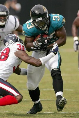 JACKSONVILLE, FL - SEPTEMBER 28:  Greg Jones #33 of the Jacksonville Jaguars carries the ball during the game against the Houston Texans at Jacksonville Municipal Stadium on September 28, 2008 in Jacksonville, Florida.  (Photo by Sam Greenwood/Getty Image