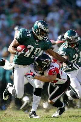 PHILADELPHIA - OCTOBER 26:  Quintin Demps #39 of the Philadelphia Eagles pushes off a tackle from Justin Tryon #20 of the Atlanta Falcons on October 26, 2008 at Lincoln Financial Field in Philadelphia, Pennsylvania.  (Photo by Chris Trotman/Getty Images)
