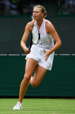 LONDON - JUNE 24:  Maria Sharapova of Russia plays a shot during the women's singles round one match against Stephanie Foretz of France on day two of the Wimbledon Lawn Tennis Championships at the All England Lawn Tennis and Croquet Club on June 24, 2008 