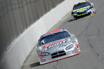 BROOKLYN, MI - JUNE 16:  David Stremme, driver of the #40 Coors Light Dodge, leads Casey Mears, driver of the #25 National Guard/GMAC Chevrolet, during practice for the NASCAR Nextel Cup Series Citizens Bank 400 at Michigan International Speedway on June 