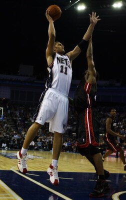 LONDON - OCTOBER 12:  Brook Lopez (#11) of New Jersey Nets attempts the shot over Udonis Haslem (#40) of the Miami Heat during the NBA preseason game as part of the 2008 NBA Europe Live Tour between New Jersey Nets and Miami Heat at the O2 Arena on Octobe
