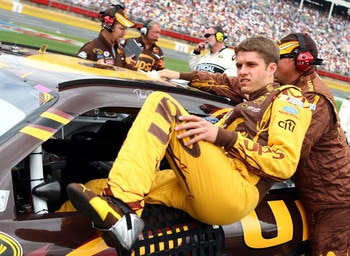 CONCORD, NC - MAY 25:  David Ragan, driver of the #6 UPS Ford, climbs into his car on the grid prior to the NASCAR Sprint Cup Series Coca-Cola 600 on May 25, 2009 at Lowe's Motor Speedway in Concord, North Carolina.  (Photo by Scott Halleran/Getty Images 