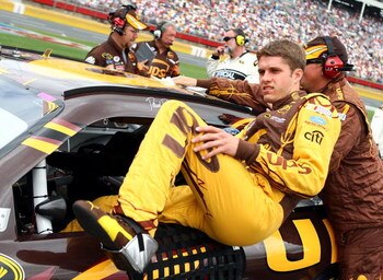 CONCORD, NC - MAY 25:  David Ragan, driver of the #6 UPS Ford, climbs into his car on the grid prior to the NASCAR Sprint Cup Series Coca-Cola 600 on May 25, 2009 at Lowe's Motor Speedway in Concord, North Carolina.  (Photo by Scott Halleran/Getty Images 