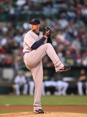 OAKLAND, CA - APRIL 13:  John Lester #31 of the Boston Red Sox pitches against the Oakland Athletics during a Major League Baseball game on April 13, 2009 at the Oakland Coliseum in Oakland, California.  (Photo by Jed Jacobsohn/Getty Images)