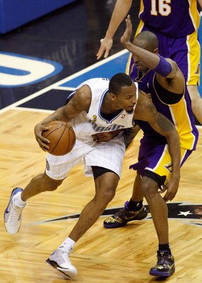 ORLANDO, FL - JUNE 11:  Rashard Lewis #9 of the Orlando Magic drives against Kobe Bryant #24 of the Los Angeles Lakers in Game Four of the 2009 NBA Finals on June 11, 2009 at Amway Arena in Orlando, Florida.  The Lakers won 99-91 in overtime.  NOTE TO USE