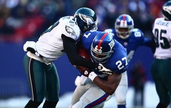 EAST RUTHERFORD, NJ -  JANUARY 11:  Brandon Jacobs #27 of the New York Giants runs the ball against the Philadelphia Eagles during the NFC Divisional Playoff Game on January 11, 2009 at Giants Stadium in East Rutherford, New Jersey.  The Eagles defeated t
