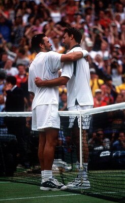 9 Jul 2001:  Goran Ivanisevic of Croatia is hugged by Pat Rafter of Australia after winning in the Men's Final's of The All England Lawn Tennis Championship at Wimbledon, London. Mandatory Credit: Gary M. Prior/ALLSPORT