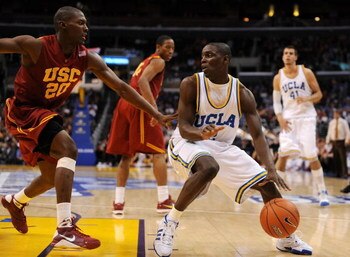 LOS ANGELES, CA - MARCH 13:  Guard Darren Collison #2 of the UCLA Bruins drives with the ball against the USC Trojans in the Pacific Life Pac-10 Men's Basketball Tournament at the Staples Center on March 13, 2009 in Los Angeles, California.  (Photo by Har