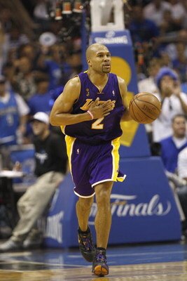 ORLANDO, FL - JUNE 11:  Derek Fisher #2 of the Los Angeles Lakers moves the ball against the Orlando Magic in Game Four of the 2009 NBA Finals on June 11, 2009 at Amway Arena in Orlando, Florida. The Lakers won in overtime 99-91. NOTE TO USER:  User expre
