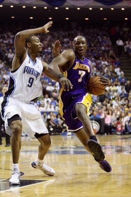 ORLANDO, FL - JUNE 11:  Lamar Odom #9 of the Los Angeles Lakers drives to the basket against Rashard Lewis #9 of the Orlando Magic in Game Four of the 2009 NBA Finals at Amway Arena on June 11, 2009 in Orlando, Florida.  The Lakers won 99-91 in overtime a