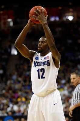 KANSAS CITY, MO - MARCH 21:  Tyreke Evans #12 of the Memphis Tigers looks to make a pass play during their second round game against the Maryland Terrapins in the NCAA Division I Men's Basketball Tournament at the Sprint Center on March 21, 2009 in Kansas