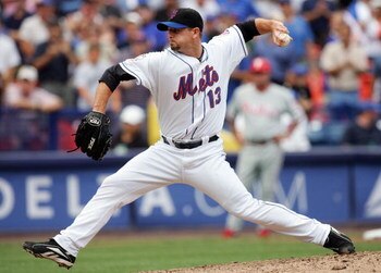 NEW YORK - JULY 24:  Billy Wagner #13 of the New York Mets pitches against the Philadelphia Phillies on July 24, 2008 at Shea Stadium in the Flushing neighborhood of the Queens borough of New York City. The Mets defeated the Phillies 3-1.  (Photo by Jim M