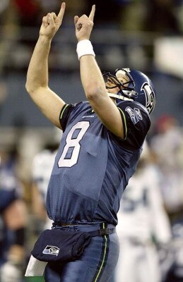 SEATTLE - JANUARY 22:  Quarterback Matt Hasselbeck of the Seattle Seahawks celebrates after the team's final touchdown in the fourth quarter of the NFC Championship Game against the Carolina Panthers at Qwest Stadium on January 22, 2006 in Seattle, Washin