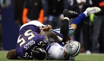 IRVING, TX - DECEMBER 20:  Linebacker Terrell Suggs #55 of the Baltimore Ravens sacks Tony Romo #9 of the Dallas Cowboys in the first quarter at Texas Stadium on December 20, 2008 in Irving, Texas.  (Photo by Ronald Martinez/Getty Images)