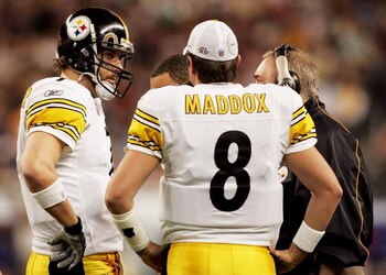 DETROIT - FEBRUARY 05:  Quarterback Ben Roethlisberger #7 of the Pittsburgh Steelers listens to back-up quarterback Tommy Maddox #8 on the sideline in the first half against the Seattle Seahawks in Super Bowl XL at Ford Field on February 5, 2006 in Detroi