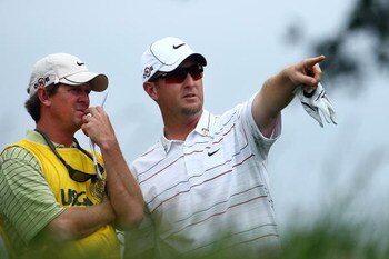 FARMINGDALE, NY - JUNE 22:  David Duval (R) talks with caddie Jeff Weber on the sixth tee during the continuation of the final round of the 109th U.S. Open on the Black Course at Bethpage State Park on June 22, 2009 in Farmingdale, New York.  (Photo by Ch