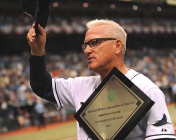 ST. PETERSBURG, FL - APRIL 19: Manager Joe Maddon #70 of the Tampa Bay Rays receives the American League coach of the year award before play against the Chicago White Sox April 19, 2009 at Tropicana Field in St. Petersburg, Florida.  (Photo by Al Messersc