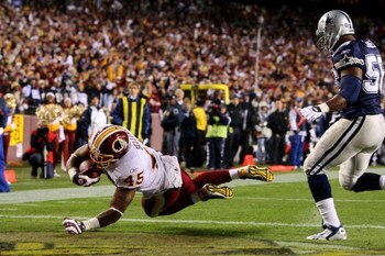 LANDOVER, MD - NOVEMBER 16:  Mike Sellers #45 of the Washington Redskins scores a touchdown in the first quarter against Bradie James #56 of the Dallas Cowboys during their game on November 16, 2008 at FedEx Field in Landover, Maryland.  (Photo by Jim McI