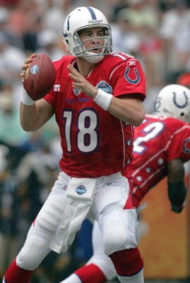 HONOLULU - FEBRUARY 12:  Quarterback Peyton Manning #18 of the AFC team looks to pass against the NFC team during the NFL Pro Bowl on February 12, 2006 at Aloha Stadium in Honolulu, Hawaii. The NFC won 23-17.  (Photo by Ronald Martinez/Getty Images) 