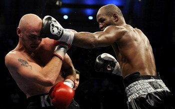 ATLANTIC CITY, NJ - OCTOBER 18:  Bernard Hopkins of Philadelphia,  Pennsylvania (R) connects with a jab to Kelly Pavlik of Youngstown, Ohio during their light heavyweight bout at Boardwalk Hall on October 18, 2008 in Atlantic City, New Jersey.  (Photo by 