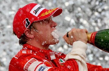 SAO PAULO, BRAZIL - OCTOBER 21:  Kimi Raikkonen of Finland and Ferrari celebrates on the podium after winning the race and the F1 World Championship at the Brazilian Formula One Grand Prix at the Autodromo Interlagos on October 21, 2007 in Sao Paulo, Braz