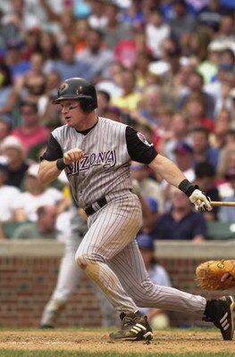 CHICAGO - AUGUST 16:  Third baseman Matt Williams #9 of the Arizona Diamondbacks runs out of the batter's box during the MLB game against the Chicago Cubs on August 16, 2002 at Wrigley Field in Chicago, Illinois.  The Diamondbacks defeated the Cubs 2-1.  