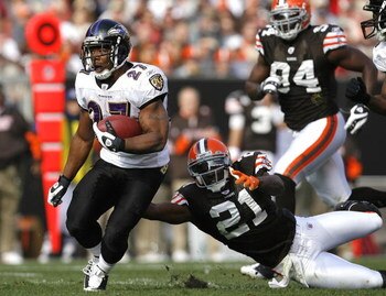 CLEVELAND - NOVEMBER 2:  Ray Rice #27 of the Baltimore Ravens runs by Brodney Pool #21 of the Cleveland Browns during the third quarter of their NFL game at Cleveland Browns Stadium November 2, 2008 in Cleveland, Ohio.  (Photo by Matt Sullivan/Getty Image