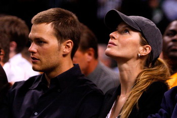 BOSTON - MAY 22: Tom Brady of the New England Patriots and Giselle Bundchen watch as the Detroit Pistons play against the Boston Celtics during Game Two of the 2008 NBA Eastern Conference finals at the TD Banknorth Garden on May 22, 2008 in Boston, Massa
