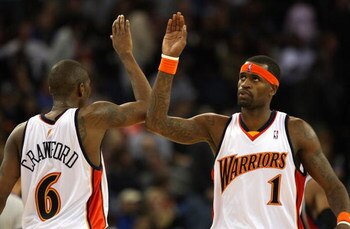 OAKLAND, CA - JANUARY 16:  Stephen Jackson #1 of the Golden State Warriors celebrates with Jamal Crawford #6 near the end of the game against the Atlanta Hawks during an NBA game on January 16, 2009 at Oracle Arena in Oakland, California. NOTE TO USER: Us