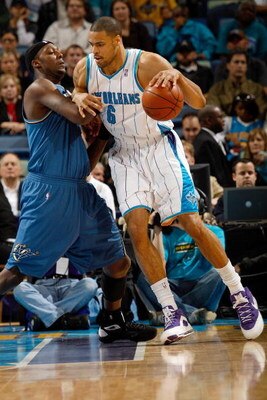 NEW ORLEANS - DECEMBER 30:  Tyson Chandler #6 of the New Orleans Hornets drives the ball around Andray Blatche #32 of the Washington Wizards on December 30, 2008 at the New Orleans Arena in New Orleans, Louisiana.  NOTE TO USER: User expressly acknowledge