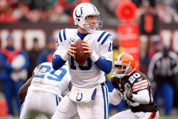 CLEVELAND - NOVEMBER 30:  Quarterback Peyton Manning #18 of the Indianapolis Colts looks to make a pass play during their NFL game against the Cleveland Browns on November 30, 2008 at Cleveland Browns Stadium in Cleveland, Ohio. The Colts defeated the Bro