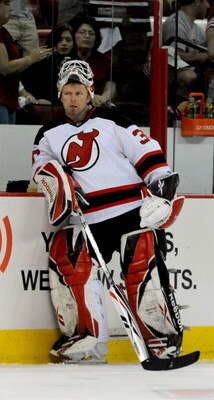 RALEIGH, NC - APRIL 26:  Goalie Martin Brodeur #30 of the Carolina Hurricanes looks on during warm-ups before Game Six of the Eastern Conference Quarterfinals of the 2009 Stanley Cup Playoffs against the New Jersey Devils on April 26, 2009 at the RBC Cent
