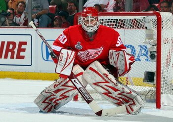 DETROIT - JUNE 12:  Chris Osgood #30 of the Detroit Red Wings skates against the Pittsburgh Penguins during Game Seven of the 2009 NHL Stanley Cup Finals at Joe Louis Arena on June 12, 2009 in Detroit, Michigan.  (Photo by Jim McIsaac/Getty Images)