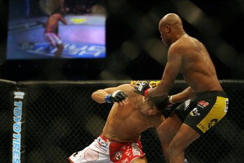 CHICAGO- OCTOBER 25:  Anderson Silva (R)  fights Patrick Cote in the Middleweight Title Bout at UFC's Ultimate Fight Night at Allstate Arena on October 25, 2008 in Chicago, Illinois. (Photo by Tasos Katopodis/Getty Images)