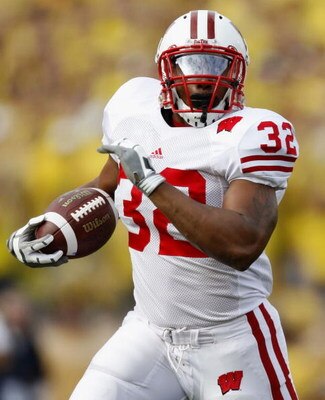 ANN ARBOR, MI - SEPTEMBER 27: John Clay #32 of the Wisconsin Badgers gets out into the open during a second quarter run against the Michigan Wolverines on September 27, 2008 at Michigan Stadium in Ann Arbor, Michigan. (Photo by Gregory Shamus/Getty Images