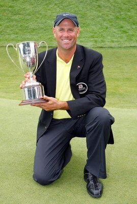 CROMWELL, CT - JUNE 22:  Stewart Cink holds the Travelers Championship trophy after winning the Travelers Championship at TPC River Highlands held on June 22, 2008 in Cromwell, Connecticut. (Photo by Jim Rogash/Getty Images)